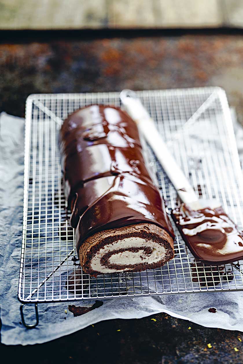 Swiss roll with dark chocolate icing and mascarpone cream