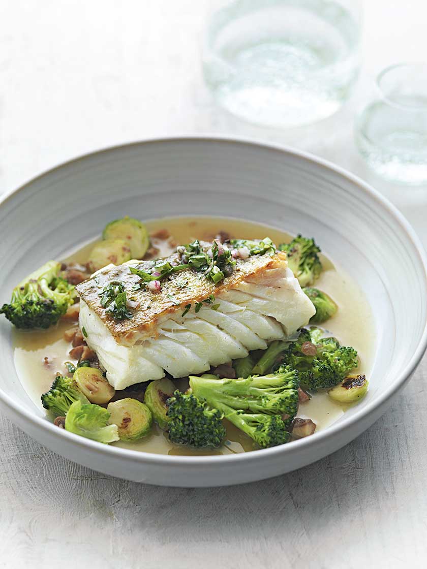 Braised cod with herb vinaigrette, toasted broccoli, sprouts and chestnuts