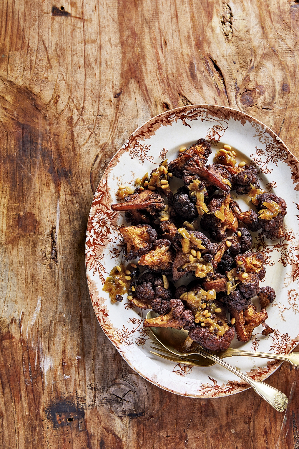 Fried cauliflower with caramelised onion currants and pine nuts p 94