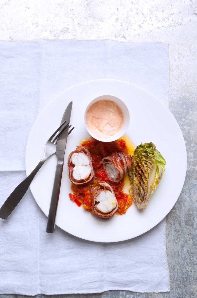 Roasted pancetta- wrapped monkfish tail with peperonata, red pepper mayonnaise and charred gem heart