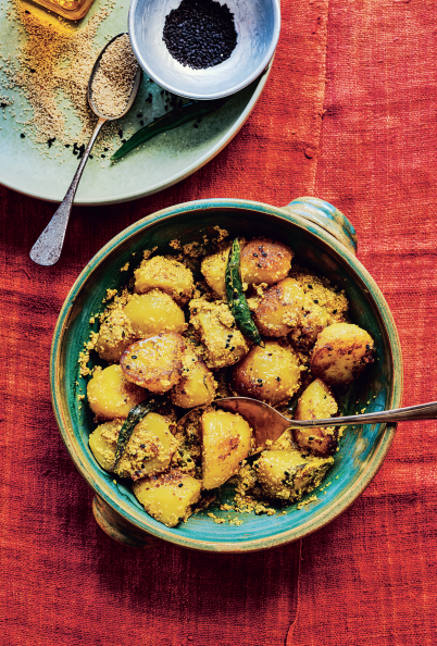 Spiced potatoes with white poppy seeds, turmeric and green chillies