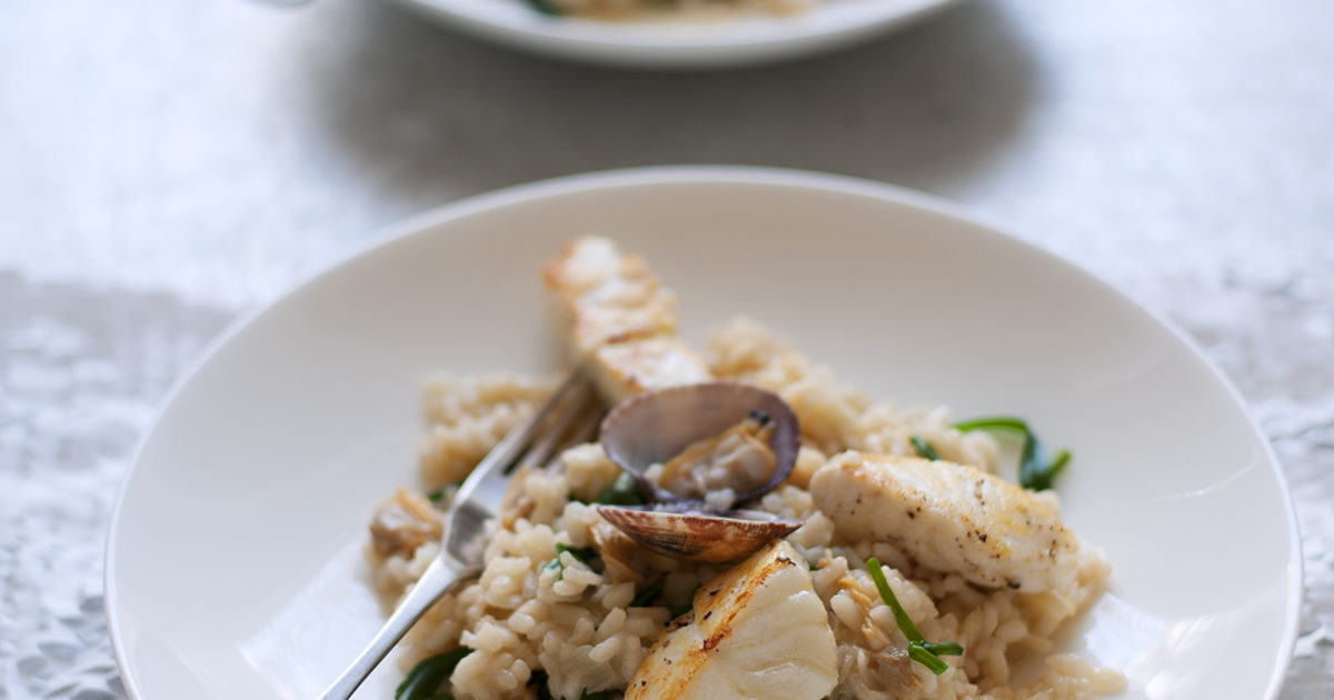 Fried halibut risotto with clams and sea… Food and Travel Magazine