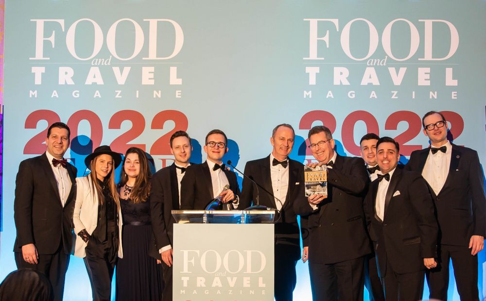 The Ritz team win Overall Restaurant of the Year with John Williams OBE