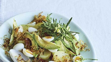 Potato, avocado, quail’s eggs and bacon with crispy shallots