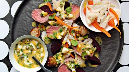 Lamb loin with roasted shallots and pickled vegetables with ravigote dressing