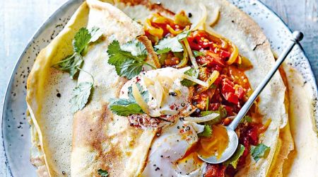 Shakshuka quinoa and buckwheat pancakes with eggs and harissa yoghurt