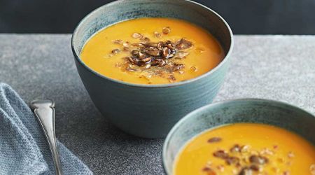 Pumpkin soup with maple-toasted seeds