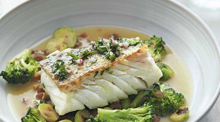 Braised cod with herb vinaigrette, toasted broccoli, sprouts and chestnuts