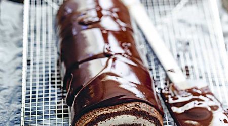 Swiss roll with dark chocolate icing and mascarpone cream