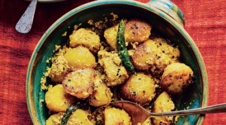 Spiced potatoes with white poppy seeds, turmeric and green chillies